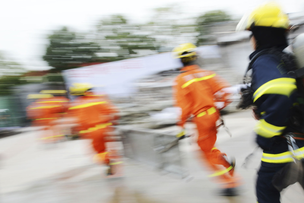 Emergency personnel running
